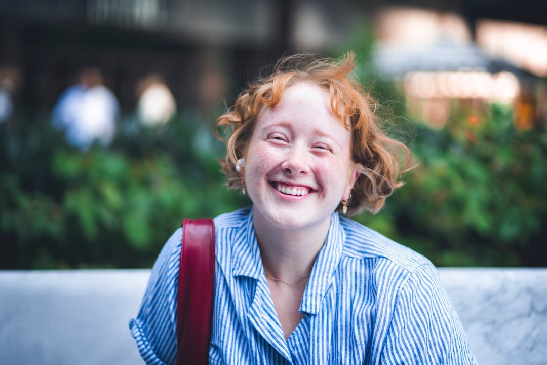woman with short red hair at event